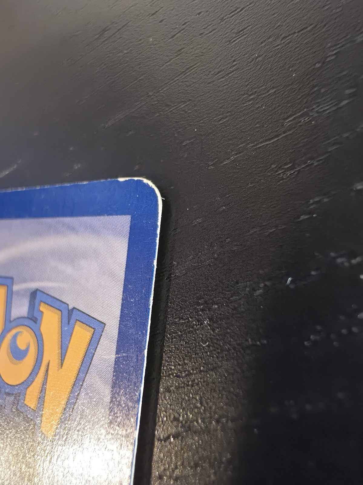 Charizard back top edge whitening close-up